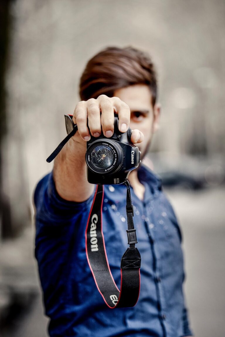 “Portrait of a photographer holding camera gear”